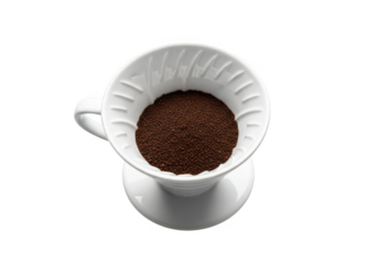 Freshly ground coffee beans ready for brewing in a sleek ceramic pour-over dripper