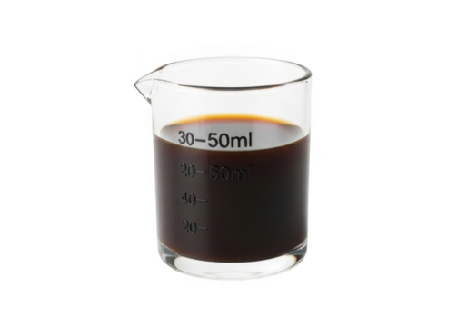 Clear glass beaker with dark liquid, precise liquid measurement for science experiments