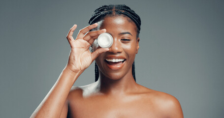 Skincare, lotion and portrait of black woman in studio for beauty, glow and self care cosmetics....