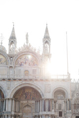 Basilica di San Marco in Venice Italy with sun flare