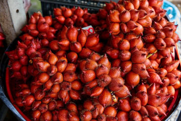 Full frame shot of ripe Zalacca fruit for sale in basket