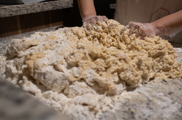 female baker's hands baking bread