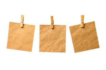 Three brown kraft paper notes on twine with clothespins
