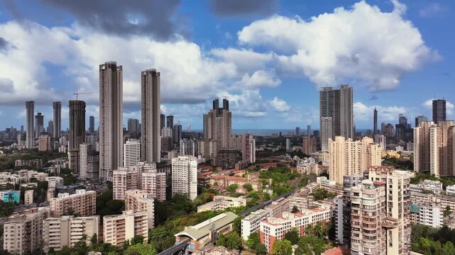 Aerial view of Mumbai city in Maharashtra, India. Beautiful cloudy weather during monsoon. Indian Cityscape
