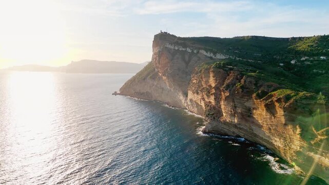 Aerial drone shot of massive high cliff Cap Canaille coastline Mediterranean sea Route des Cretes in Cassis