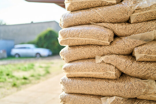 One ton of wood pellets stacked for household use