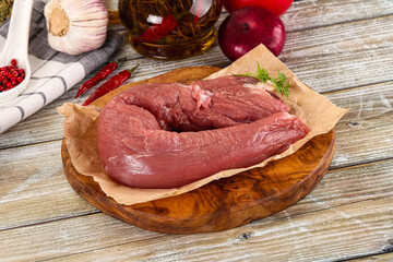 Raw pork tenderloin for cooking