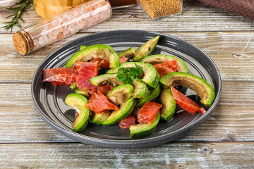 Salad with avocado and salmon