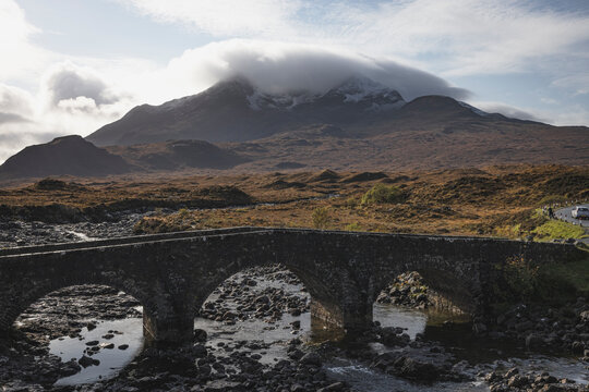 bridge under the mountain  and fog