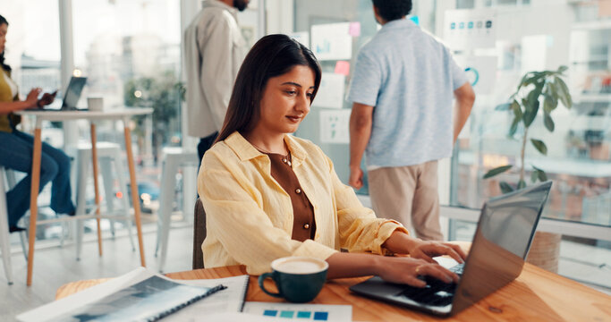 Business, laptop and woman in office, typing and sales agency with marketing design. Person, employee and consultant in workplace, pc and research with subscription for company website, app and email - Powered by Adobe