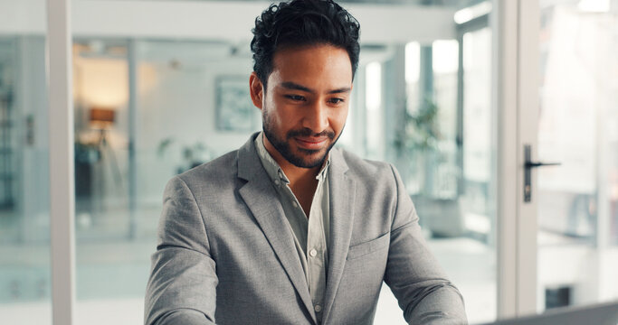 Happy, employee and man with laptop, office and financial analysis on website, reading and research. Investment banker, person and planning for pitch with technology, online or checking stock market