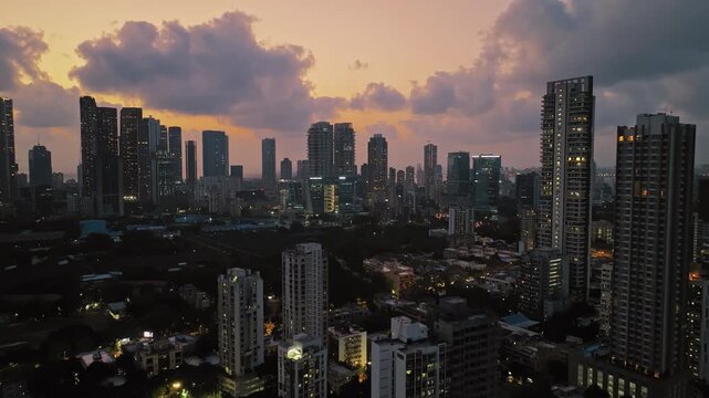 Aerial view of Mumbai city at night. Mumbai night view cityscape. Central Mumbai's cityscape and skyline- Lalbaug-Parel, Lower Parel, Worli, Curry Road, Prabhadevi.