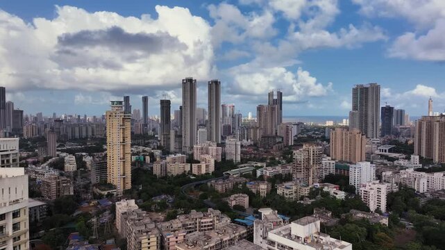 Arial view of Mumbai Skyline, high-rise buildings in Mumbai, Maharashtra India. Cinematic Timelapse shot of Indian cityscape. Most Posh Areas of Worli-Lower Parel in Mumbai.