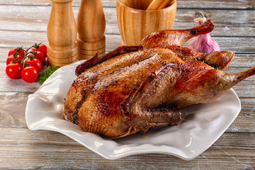 Baked with spices whole duck
