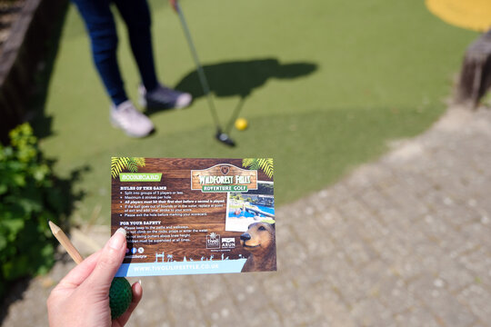 Bognor Regis, West Sussex, England. 2nd June 2025. Player Holding Crazy Golf Scorecard and Pencil at Wildforest Falls Adventure Golf, Hotham Park