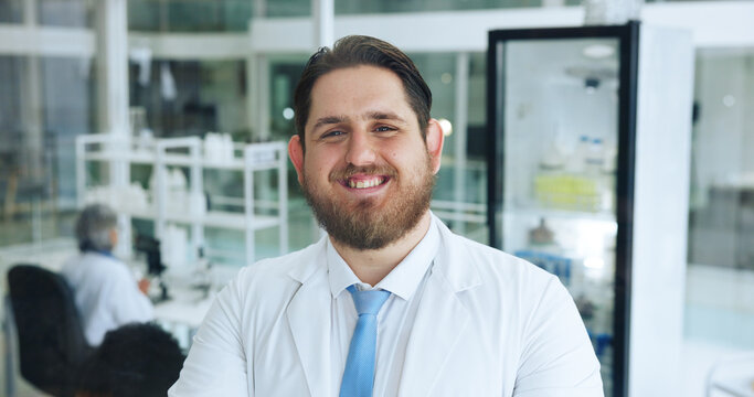 Portrait, man and scientist with smile in lab for career pride, about us and medical experiment. Happy, male person and research of healthcare study, pharmaceutical innovation and vaccine development