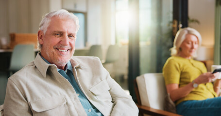 Fototapeta premium Break, portrait and smile of old man on sofa in living room of home with wife for retirement. Relax, weekend and wellness with happy senior people in apartment together for chilling or free time