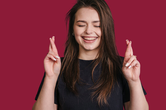 Hopeful woman anticipates, Relaxed woman hopes for positive outcome