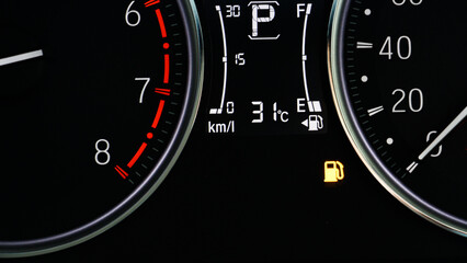 Fototapeta premium The icon of Oli Low Fuel Level Warning Light icon symbol on dashboard Car miles or Speed of meter with. transportation concept.