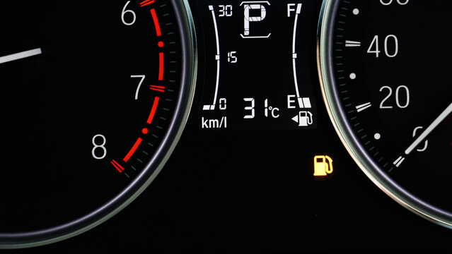 The icon of Oli Low Fuel Level Warning Light icon symbol on dashboard Car miles or Speed of meter with. transportation concept.
