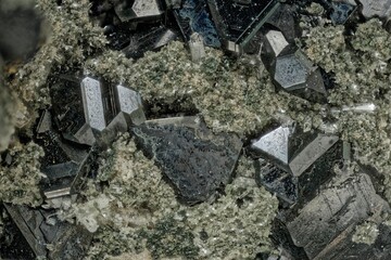 Sphalerite macro crystals from Dalnegorsk, Russia — cubic system, metallic luster with striations — professional macro, micro mineral photography for education and research