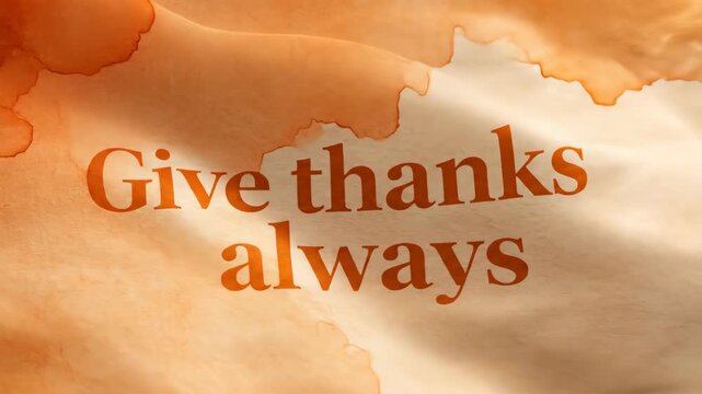 Give thanks always message on waving aged orange paper surface with watercolor stain texture, Thanksgiving holiday concept, animation.