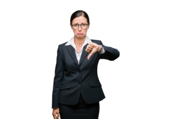 A serious businesswoman wearing glasses and a dark suit expresses disapproval with a thumbs down gesture isolated on transparent background
