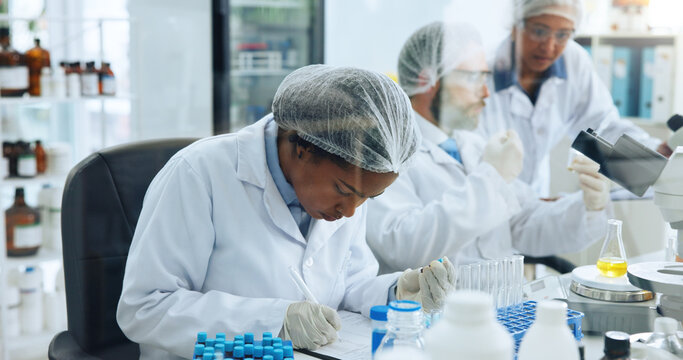 Blood sample, writing and science with woman in laboratory for medical development or research. DNA, notebook and observation with doctor at work on clinical trial, investigation or pharmaceuticals