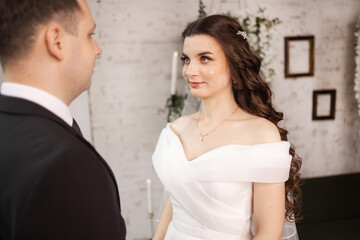 Portrait of a beautiful bride and groom at their wedding day. first meeting of the bride and groom.