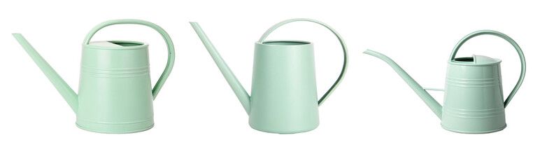 Three mint green watering cans for gardening