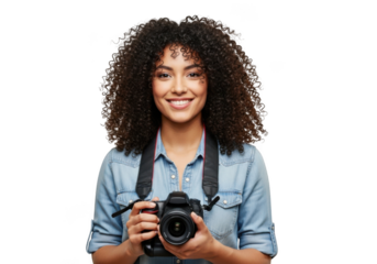 Young woman with curly hair holding a professional camera and smiling happily isolated on transparent background