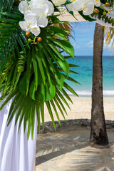 A destination wedding framed by sea, sky, and flowers. Where paradise meets eternal love