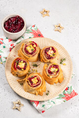 Delightful cranberry feta phyllo bites served on a decorative plate for a tasty appetizer