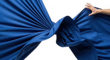 Hand holding flowing blue fabric in motion isolated on transparent background