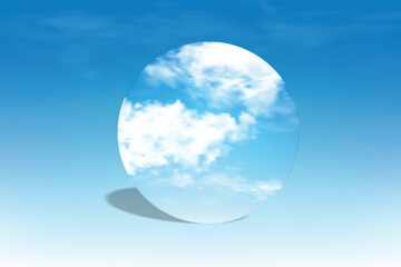 Minimal round mirror reflecting bright blue sky and clouds on blue background. Clean and modern composition ideal for product mockup, cosmetic display, branding, and design presentation.