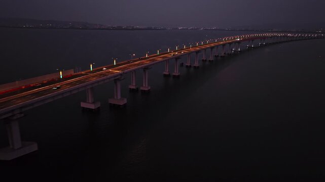 India's Longest Sea Bridge 'Trans-Harbour Sea Link. Nhava Sheva-Sewri sea bridge or Atal Setu in Mumbai, Maharashtra, India. A city at night.