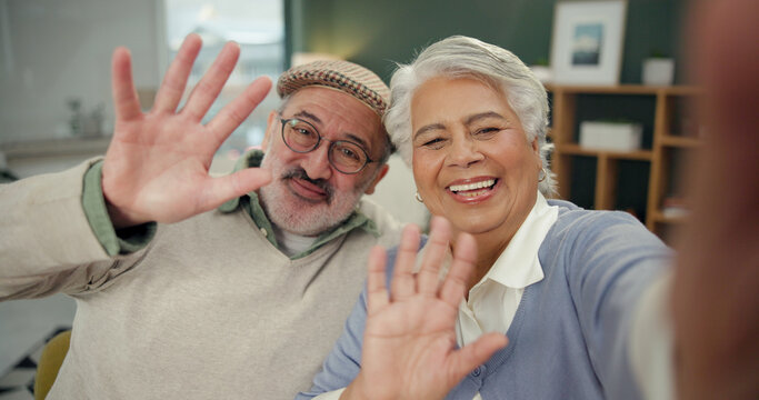 Senior couple, video call and wave in home with pov, smile and contact with hello in lounge. Elderly people, happy and greeting with virtual chat web, social media and portrait in retirement at house - Powered by Adobe