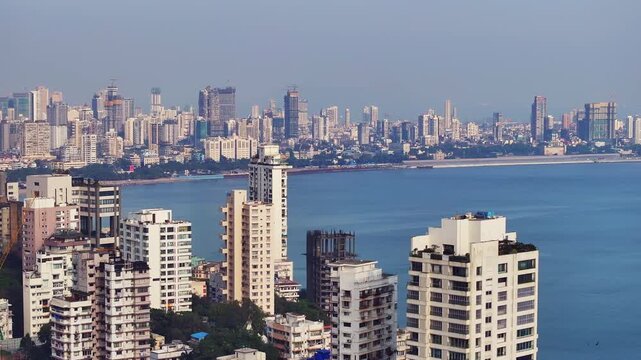 Aerial view of the Mumbai skyline featuring high-rise buildings in South Mumbai, Maharashtra, India. A cinematic shot capturing the stunning cityscape of Mumbai&rsquo;s iconic financial district.