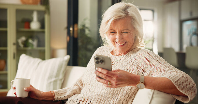 Home, smartphone and old woman on sofa, smile and funny meme with social media. Apartment, mobile user and mature person on couch, cellphone and message to contact, texting and app for online humor - Powered by Adobe