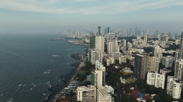 Aerial view of the Mumbai skyline featuring high-rise buildings in South Mumbai, Maharashtra, India. A cinematic shot capturing the stunning cityscape of Mumbai&rsquo;s iconic financial district.