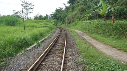 Obraz premium Railway Track Perspective View at sunset