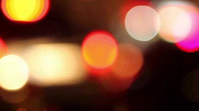 Soft pink and magenta abstract dreamy bokeh background loop with lights slowly floating upwards
