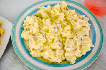 Traditional Greek potato salad flavoured with fresh herbs
