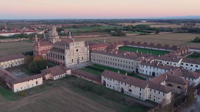 Certosa di Pavia aerial shot at sunset Gra-Car (Gratiarum Carthusia, Monastery of Santa Maria delle Grazie - Sec. XIV),Pavia, Italy.