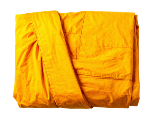  Folded Saffron Buddhist Monk Robe, Front View, isolated on transparent background PNG