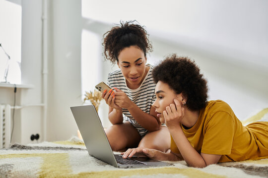 Happy African American couple enjoying quality time at home in a modern apartment