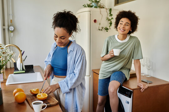 Happy couple enjoying quality time in their modern apartment kitchen
