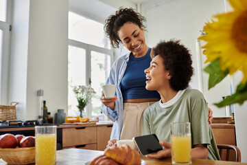 Joyful moments shared between two women in a stylish home setting