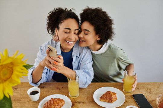 Happy lesbian couple sharing joy and moments in their modern home - Powered by Adobe