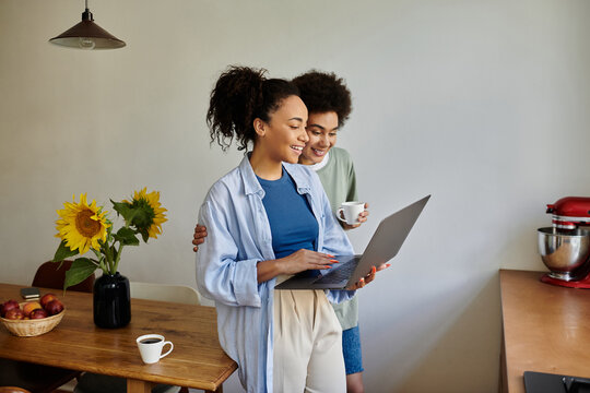 Happy African American couple enjoying quality time together in their modern apartment